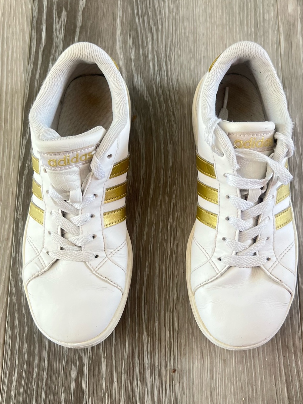 adidas White Kids Sneakers with Gold Stripes
